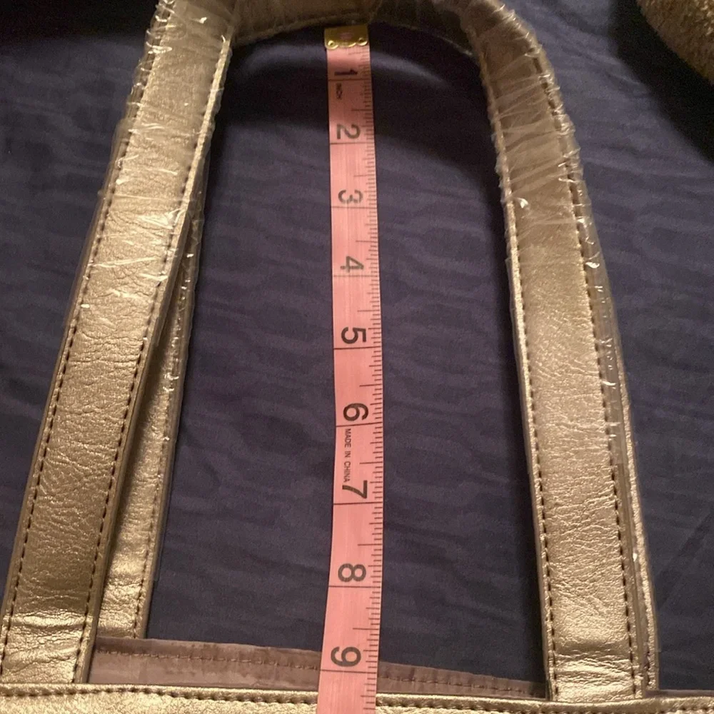 Neiman Marcus NWOT gold expandable tote. - Picture 8 of 10